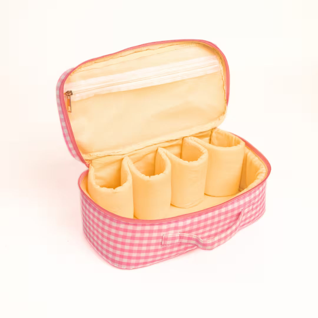 Brown gingham Dyson Airwrap travel pouch with pink detailing and organised compartments